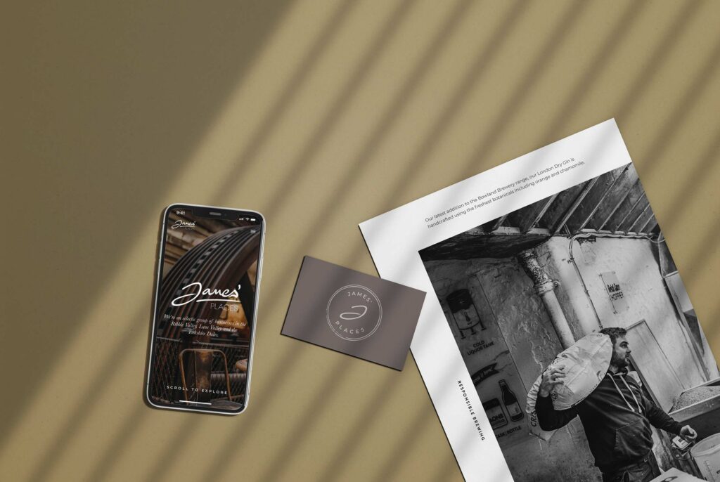 James' Places mockup on phone, with a poster and a business card next to it.