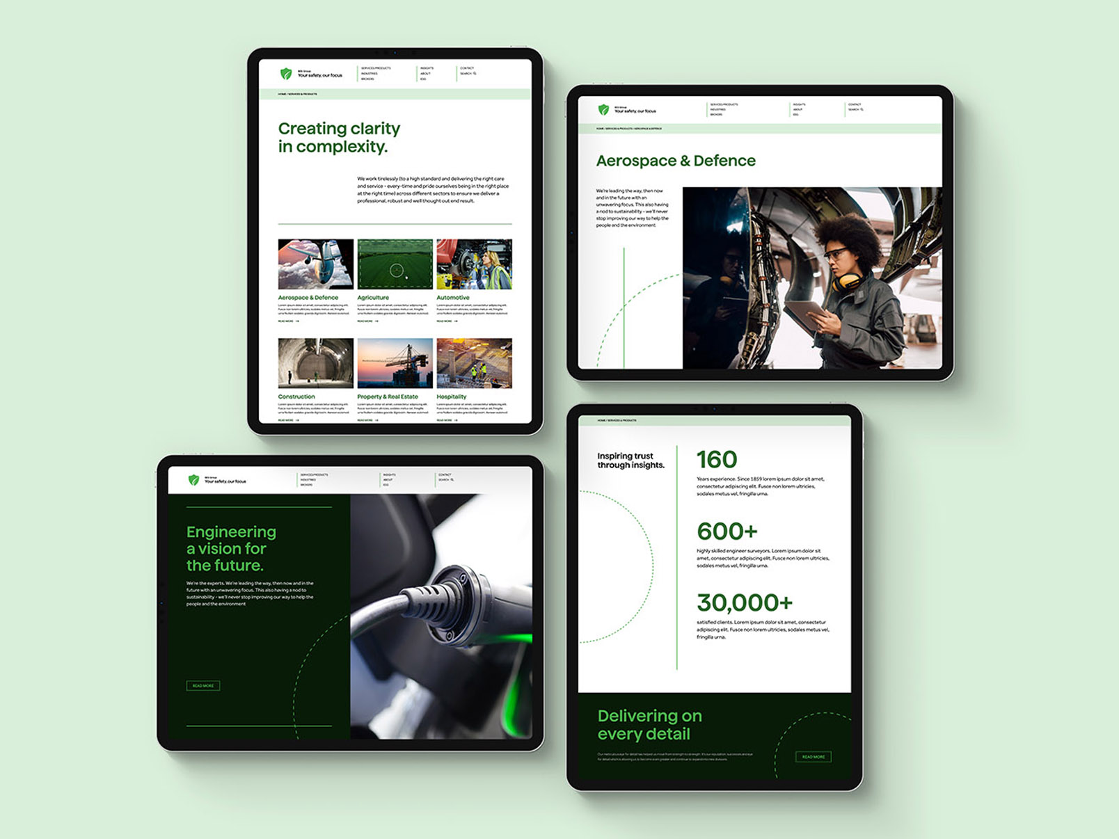 Four tablets displaying the new British Engineering brand across their website pages.