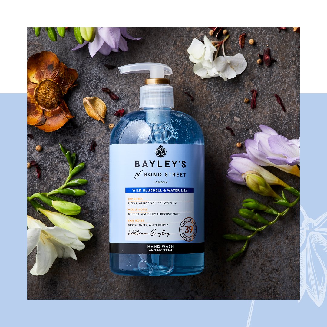 Product photography of Bayley's of Bond Street soap against flowers.