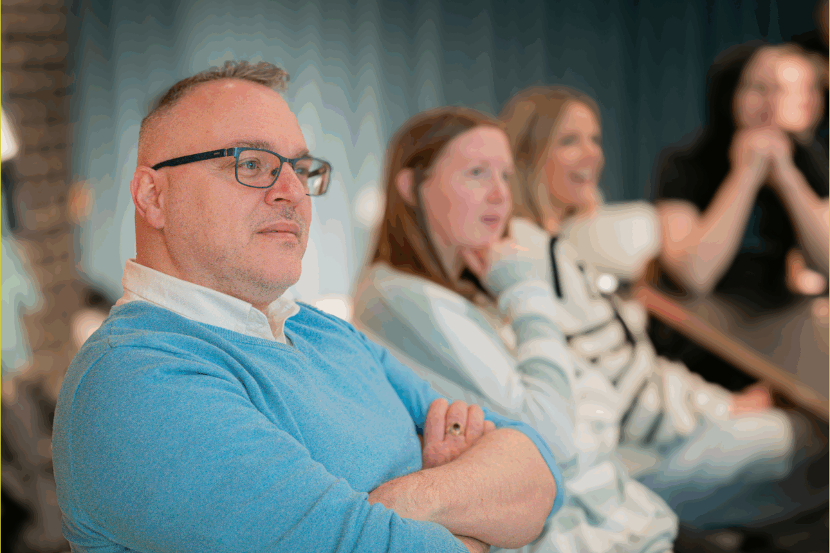 Colleagues listening to a seminar